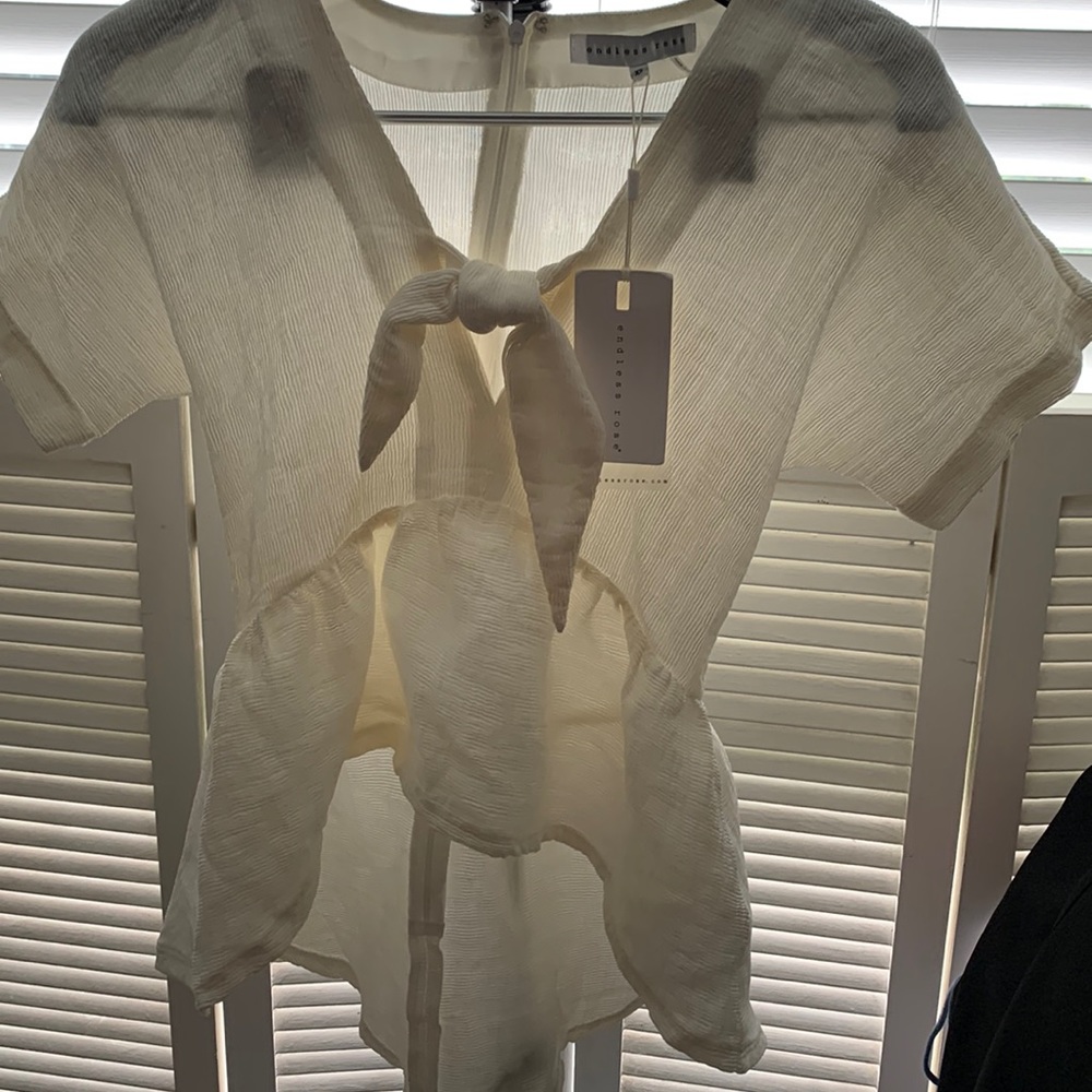 Endless Rose Cream colored blouse